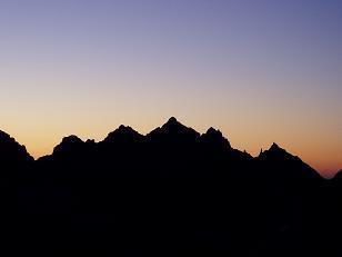 Sunrise behind Lemah Mountain from summit of Big Snow Mountain