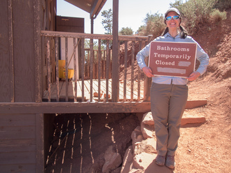 Lindsay helps keep tourists away from the outhouse while our friend (who is on trail crew) cleans them.